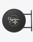 Round LED light box sign for an Organic Cafe, with a black frame and an acrylic surface, featuring the cafe's name in a stylish font.
