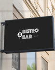 Illuminated bistro bar signage glowing at night for maximum street visibility