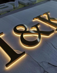 Luxury gold finish backlit channel letters for high-end storefront branding