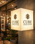 Interior wayfinding cube sign showing room number for hotels and offices