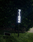 Sleek matte black freestanding address sign with durable metal construction