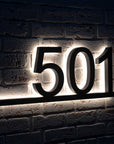 Modern LED backlit house numbers with underline and matte black finish