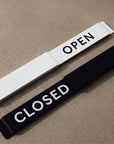 Modern Open / Closed slider sign in matte white with OPEN showing