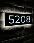 Warm white 3000K LED address sign creating a soft luxury glow for entryways