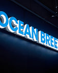 Custom full lit acrylic letters forming a glowing business sign