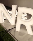 Light-diffusing acrylic letters with a soft, even storefront glow