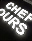Full lit acrylic letter sign for a retail storefront facade
