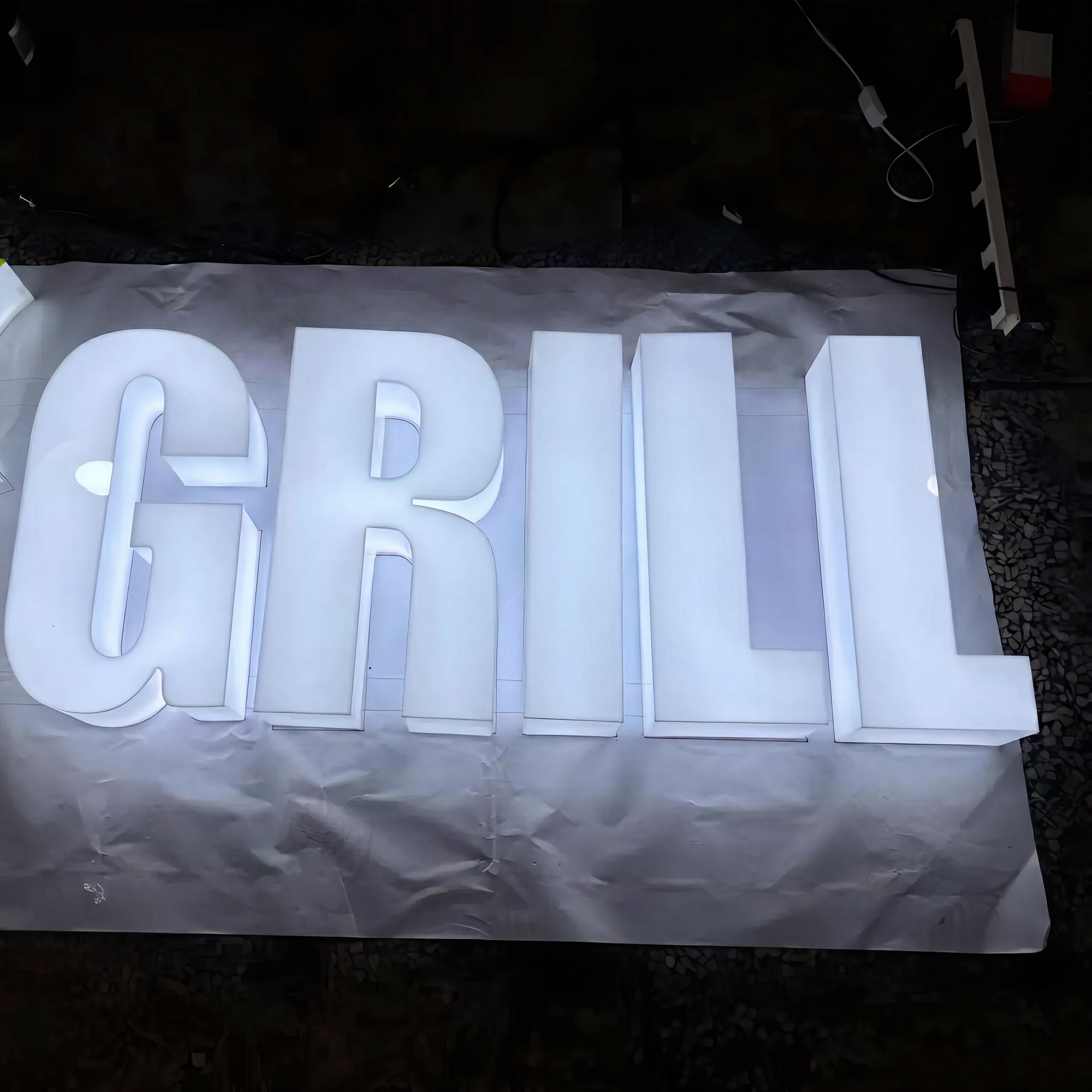 Illuminated acrylic business letters with face and sides lit together
