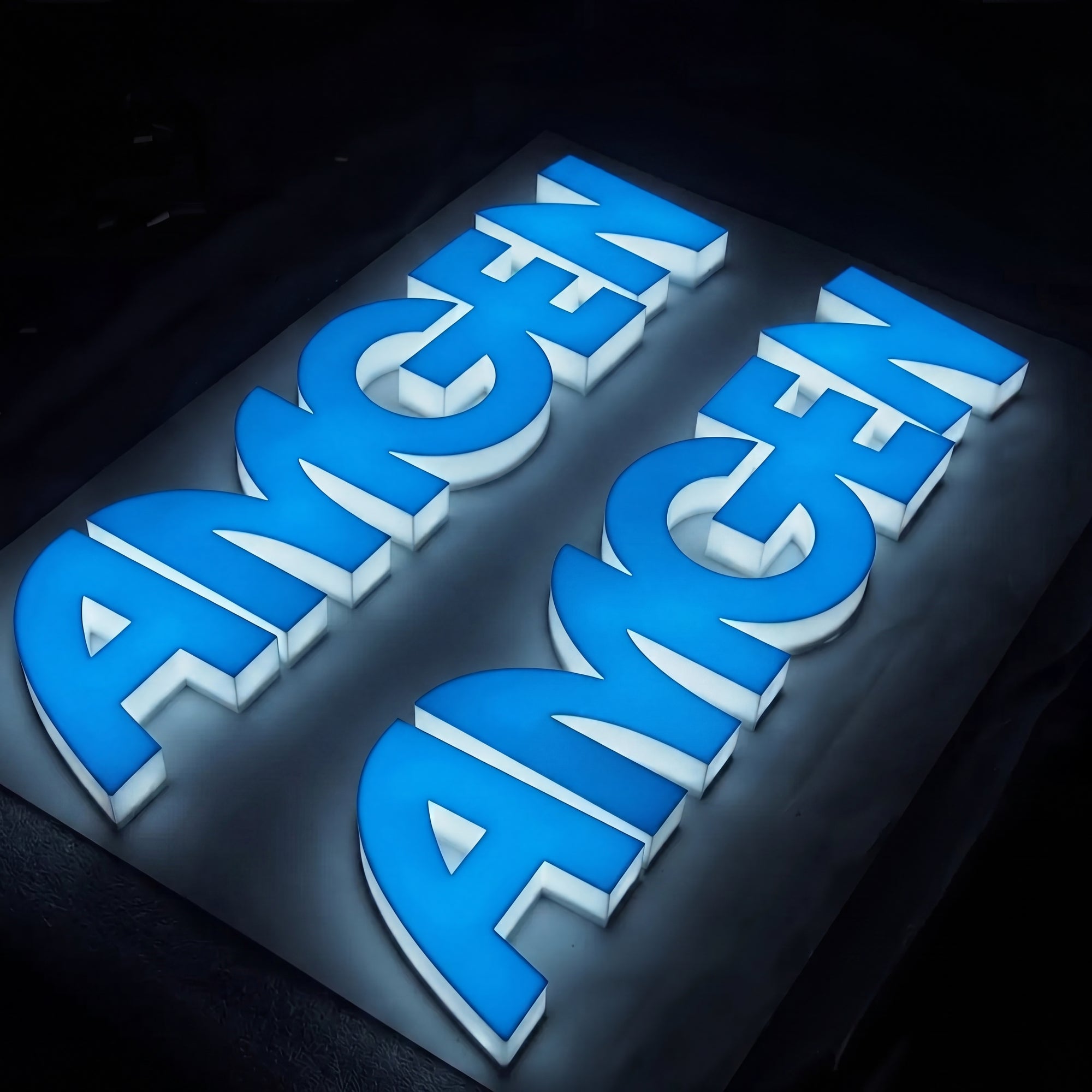 Custom 3D acrylic letter sign glowing edge to edge for a storefront
