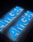 Custom 3D acrylic letter sign glowing edge to edge for a storefront