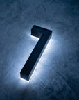 Solar house number 1 in cool white at night