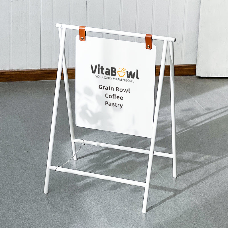 Black metal A-frame sidewalk sign for high street business visibility