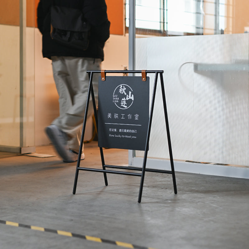 Blank black sidewalk sign board suitable for daily specials and menus