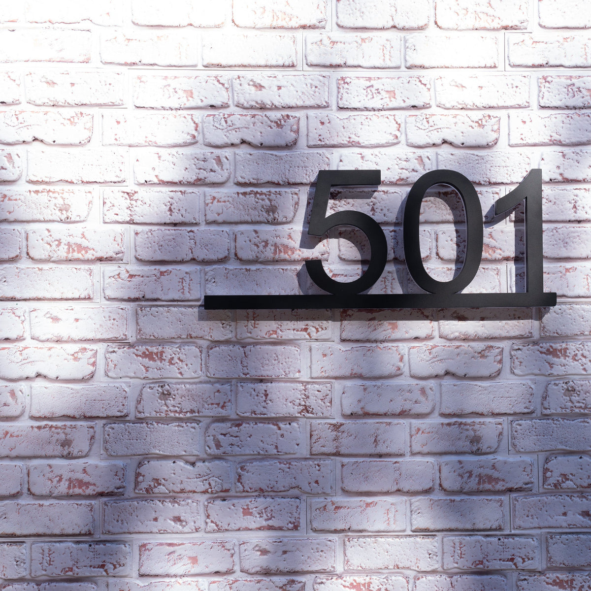 Home exterior curb appeal upgrade featuring modern backlit address signage