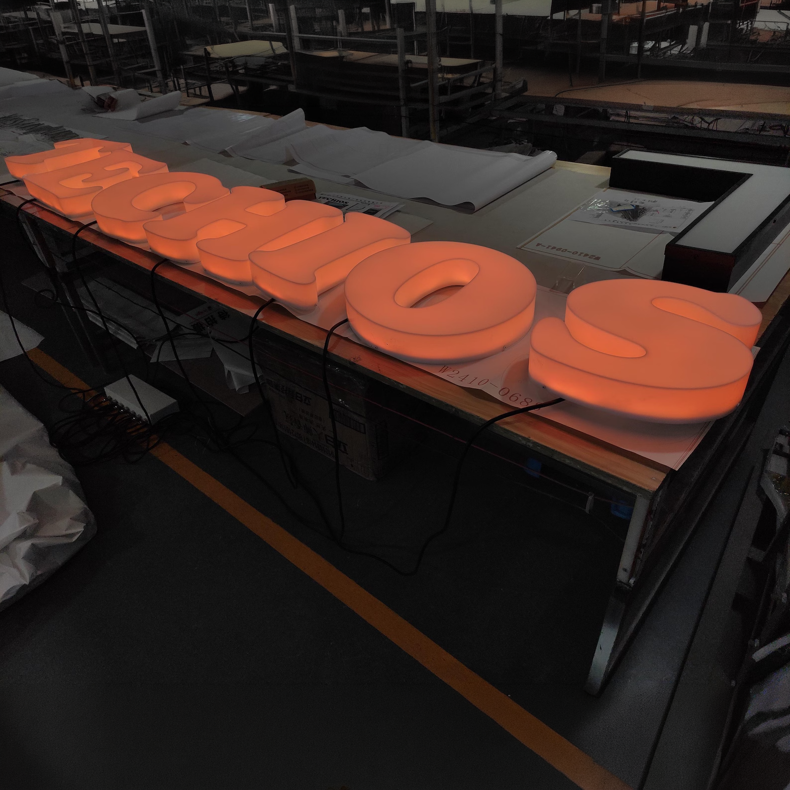 Full lit 3D acrylic letters spelling a custom business name