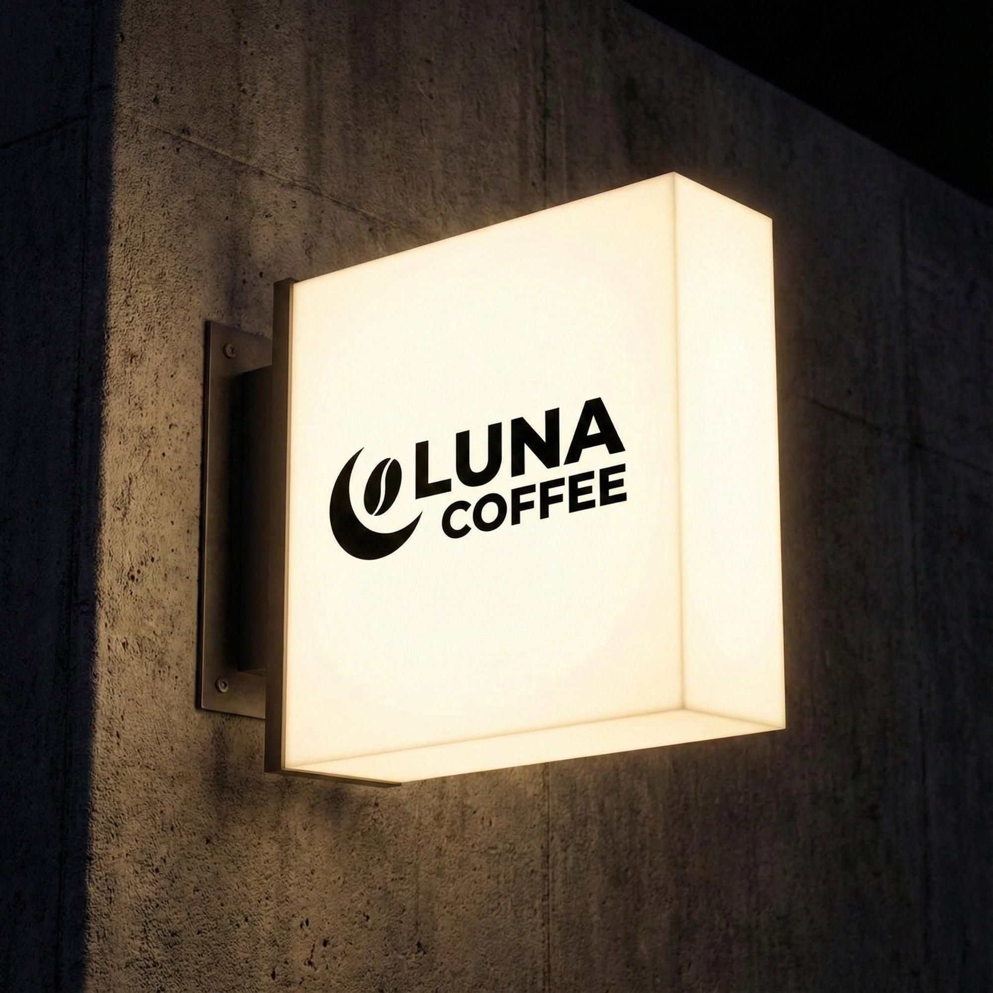 Illuminated wall mounted coffee shop sign featuring modern branding on brick wall