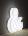 Close-up of a full lit acrylic letter showing the illuminated side