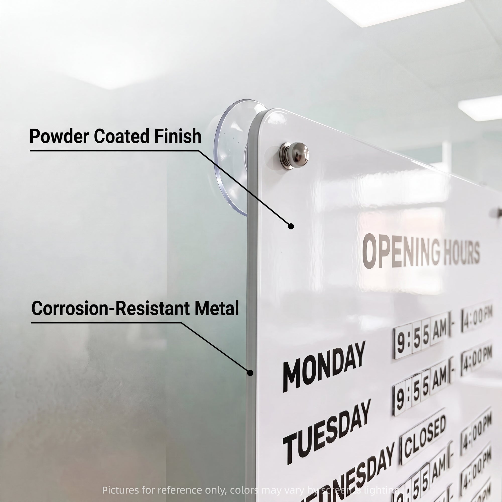 Corner detail of the white business hours sign showing the powder-coated steel panel and suction cup mount