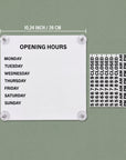 White magnetic business hours sign, 10.24 inches / 26 cm square, shown with the changeable tile sheet