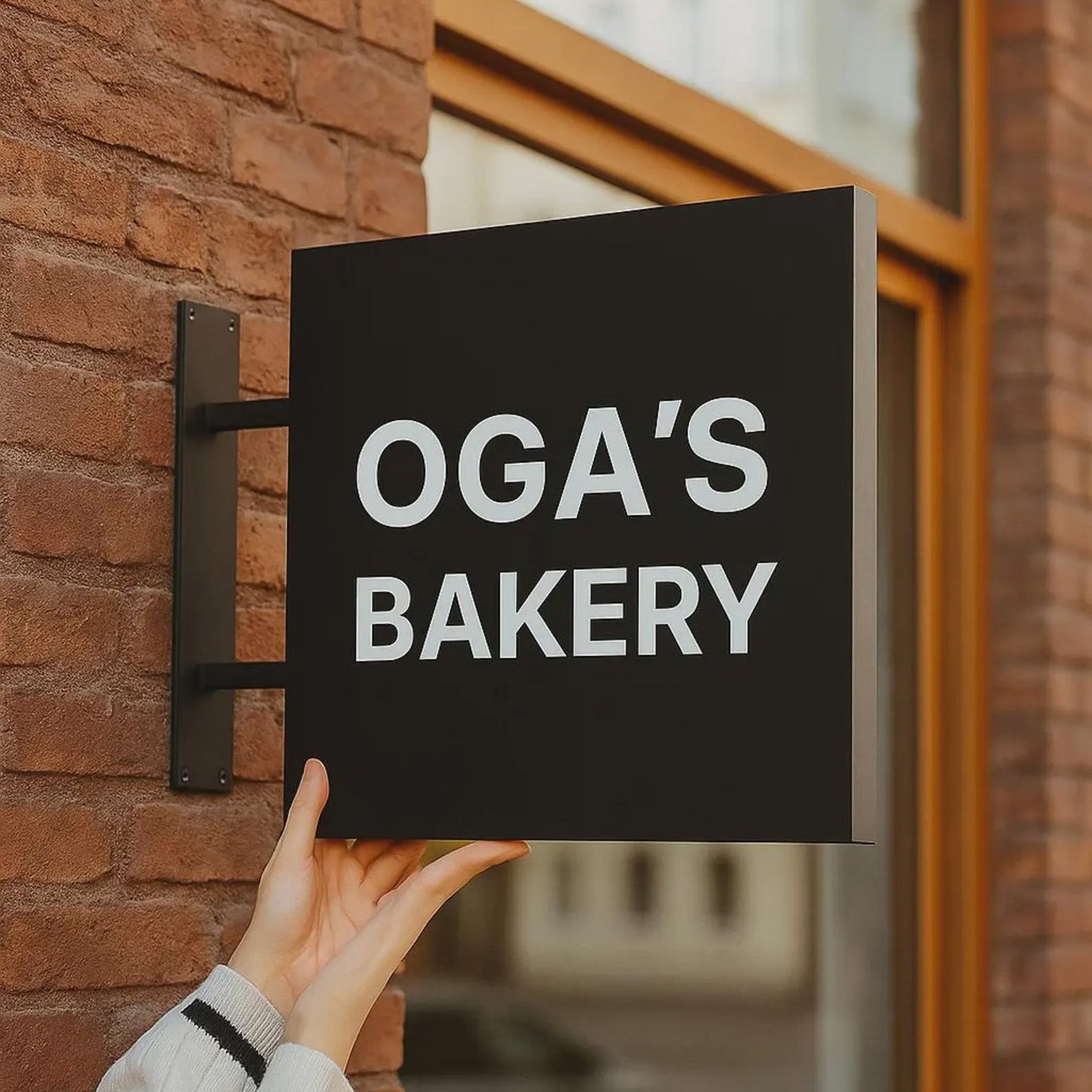 Minimalist white metal business plaque for modern boutique exterior