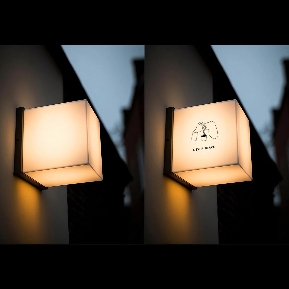 Outdoor LED cube sign hanging above cafe entrance with warm white light