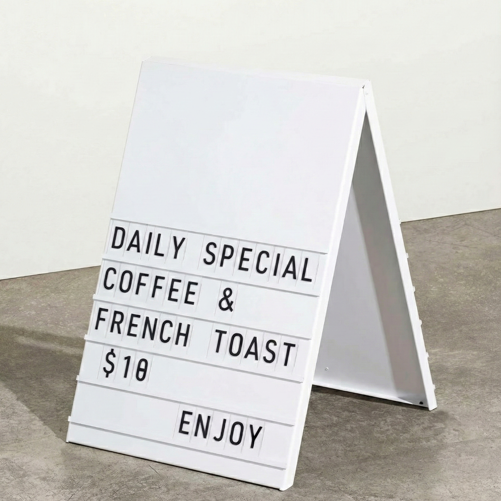 Restaurant entrance menu board highlighting grilled salmon and risotto special