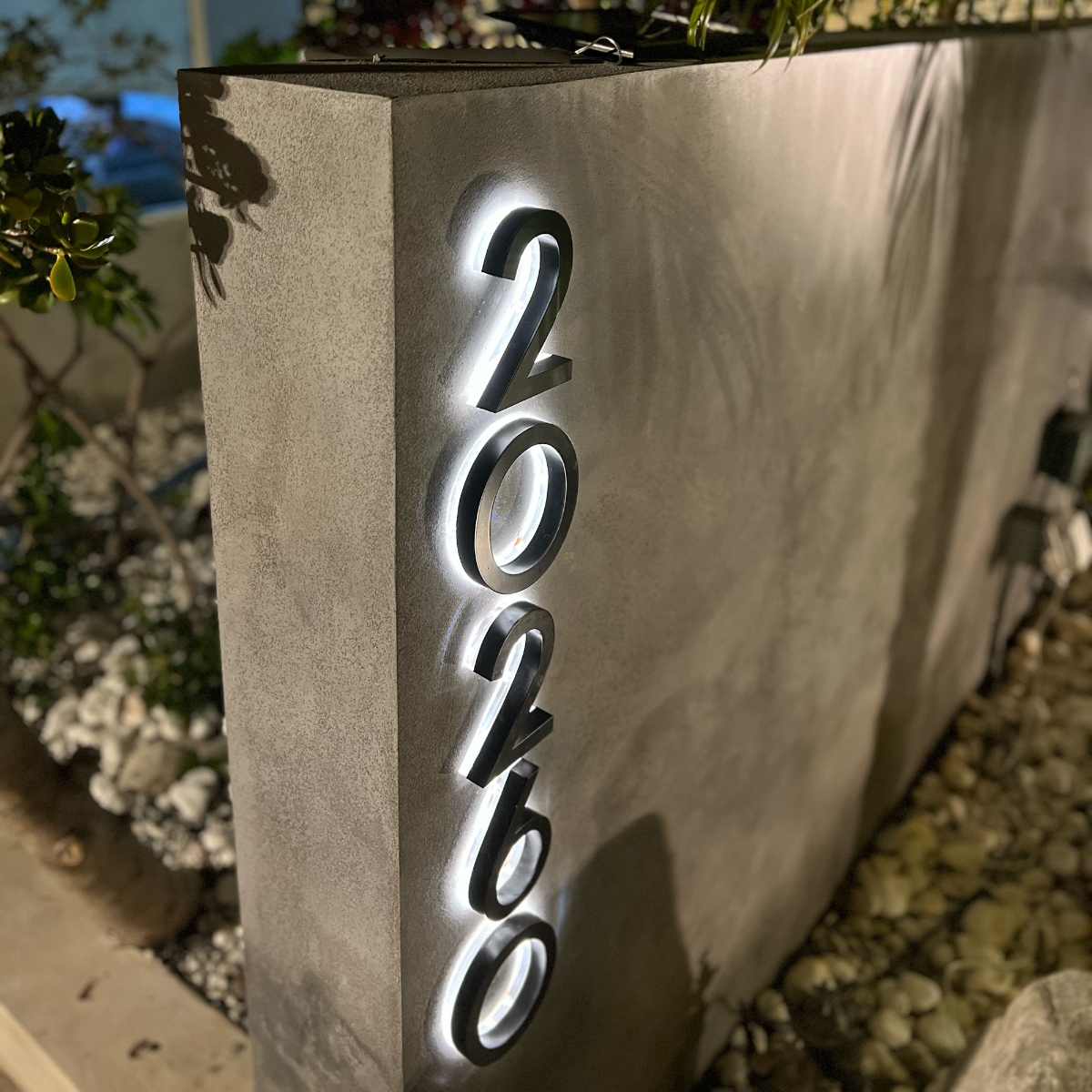 Solar powered address sign with automatic dusk to dawn sensor