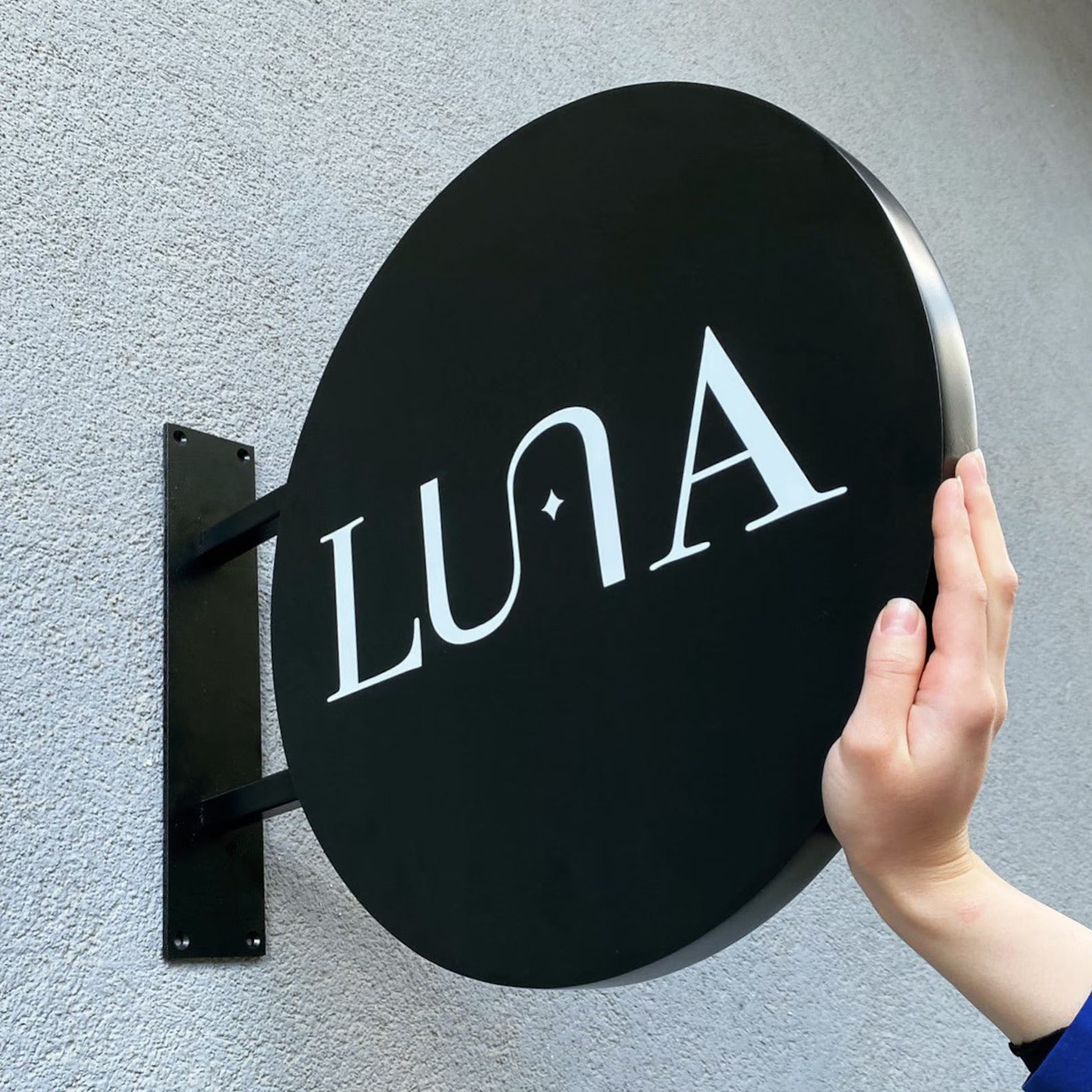 Weatherproof outdoor business sign designed to withstand rain and wind